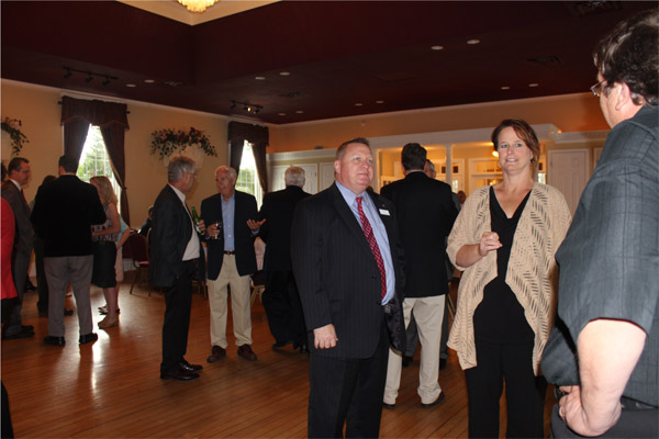 Members and Officers of the EWCC enjoying the social hMore 2013 Ann. Mtg Photosour.