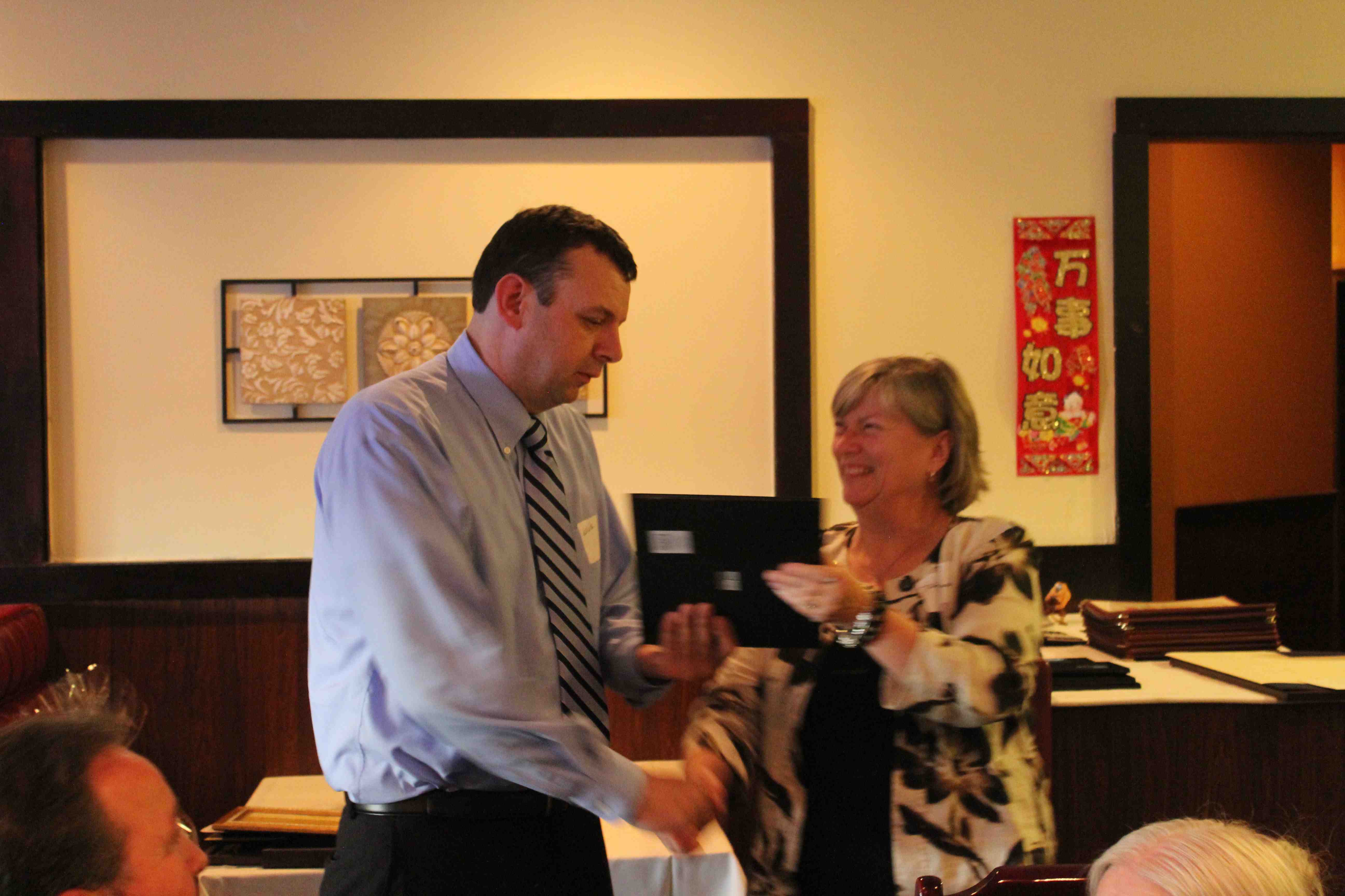 Leslie Hickey 2012 "Business Person of the Year" congratulated by 1st Selectman Denise Menard
